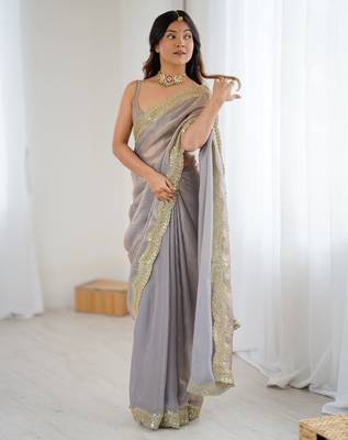Grey tissue satin sequins saree with unstitched blouse piece. 3
