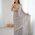 Grey tissue satin sequins saree with unstitched blouse piece.
