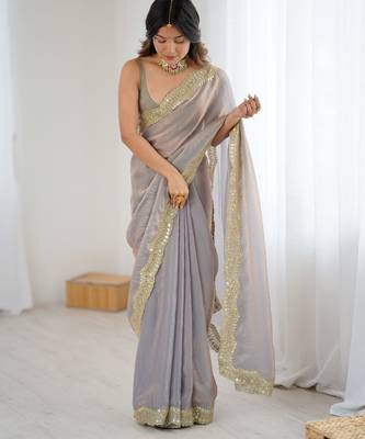 Grey tissue satin sequins saree with unstitched blouse piece. 5