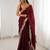 Maroon tissue satin sequins saree with unstitched blouse piece.
