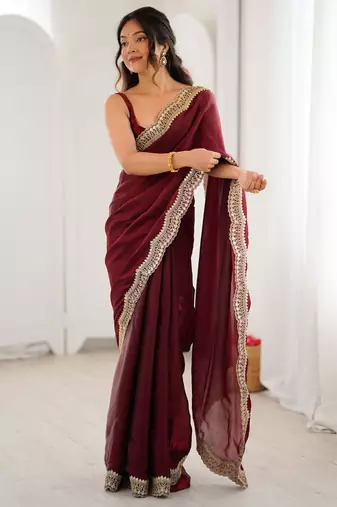 Maroon tissue satin sequins saree with unstitched blouse piece.