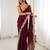 Maroon tissue satin sequins saree with unstitched blouse piece.
