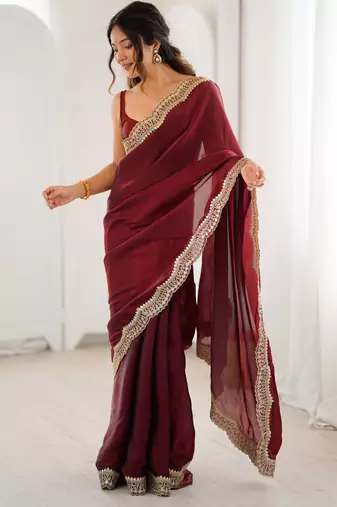 Maroon tissue satin sequins saree with unstitched blouse piece.