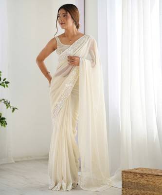 Cream georgette sequins saree with unstitched blouse piece. 5