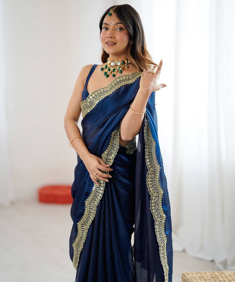 Navy blue tissue satin sequins saree with unstitched blouse piece.