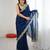 Navy blue tissue satin sequins saree with unstitched blouse piece.