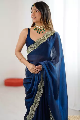 Navy blue tissue satin sequins saree with unstitched blouse piece.