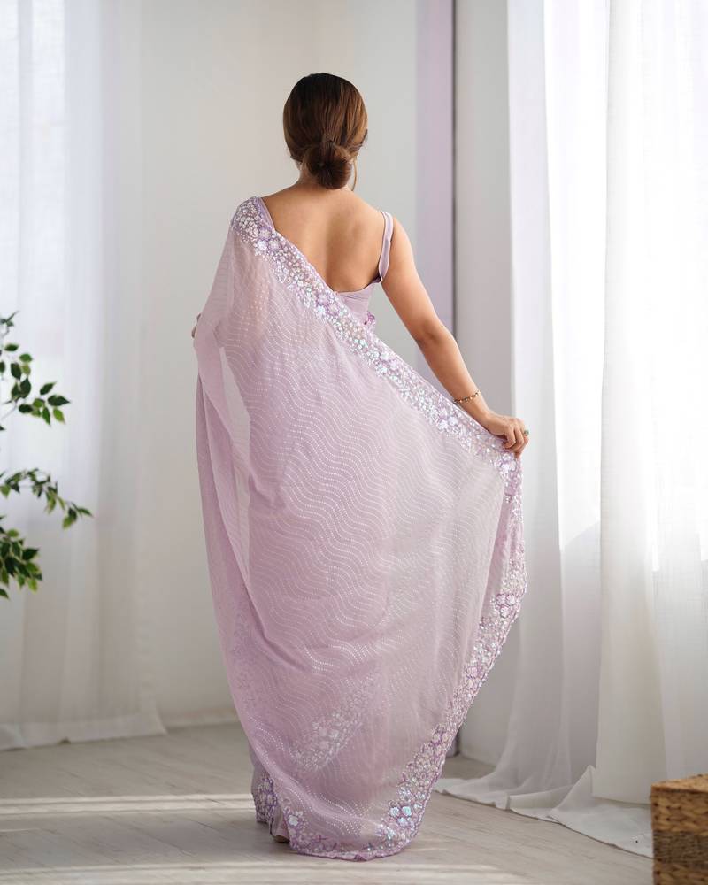 Lialc georgette sequins saree with unstitched blouse piece.