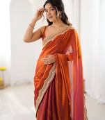 Orange tissue satin sequins saree with unstitched blouse piece.