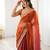 Orange tissue satin sequins saree with unstitched blouse piece.