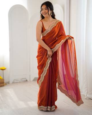 Orange tissue satin sequins saree with unstitched blouse piece. 2