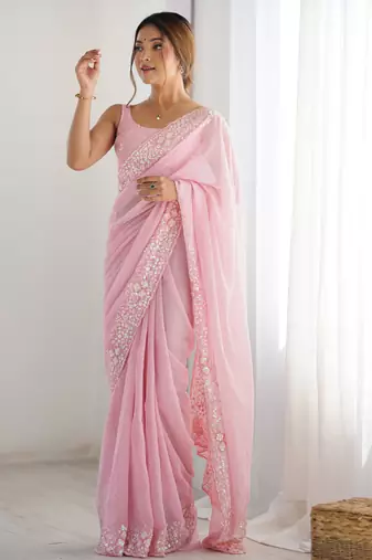Pink georgette sequins saree with unstitched blouse piece.