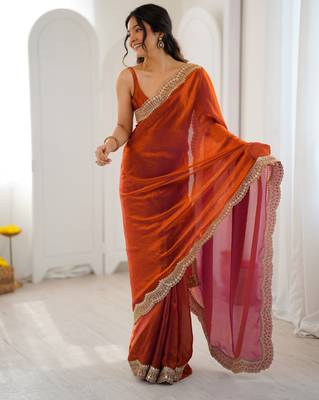 Orange tissue satin sequins saree with unstitched blouse piece. 5