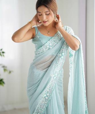 Sky blue georgette sequins saree with unstitched blouse piece. 1