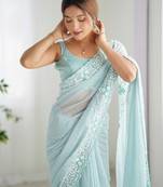 Sky blue georgette sequins saree with unstitched blouse piece.
