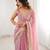 Pink tissue satin sequins saree with unstitched blouse piece.