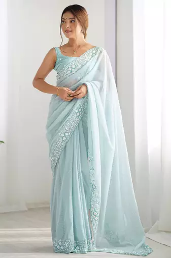 Sky blue georgette sequins saree with unstitched blouse piece.
