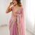Pink tissue satin sequins saree with unstitched blouse piece.