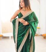 Green tissue satin solid saree with unstitched blouse piece.
