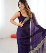 Purple tissue satin sequins saree with unstitched blouse piece.