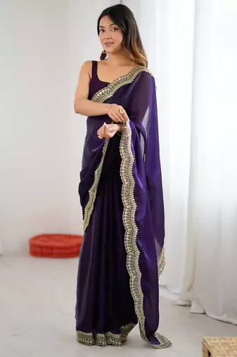 Purple tissue satin sequins saree with unstitched blouse piece.