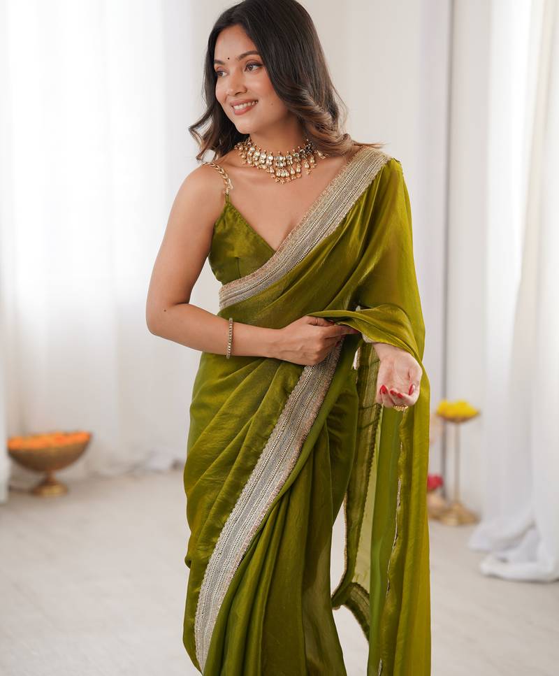 Olive tissue satin solid saree with unstitched blouse piece.