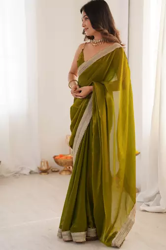 Olive tissue satin solid saree with unstitched blouse piece.