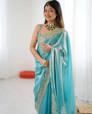 Sky blue tissue satin sequins saree with unstitched blouse piece. 4