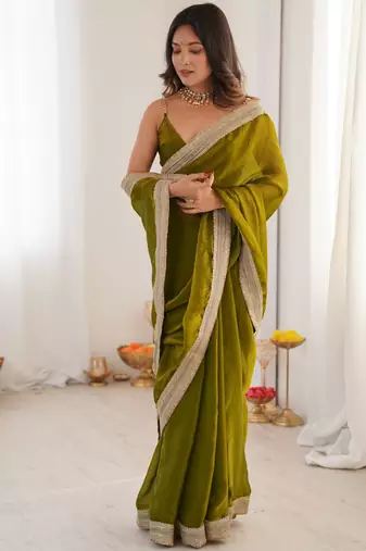 Olive tissue satin solid saree with unstitched blouse piece.