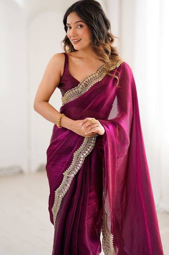 Wine tissue satin sequins saree with unstitched blouse piece.