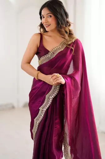 Wine tissue satin sequins saree with unstitched blouse piece.