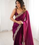 Wine tissue satin sequins saree with unstitched blouse piece.