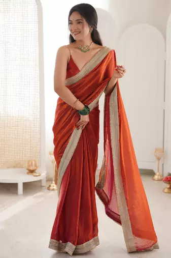 Oeange tissue satin solid saree with unstitched blouse piece.