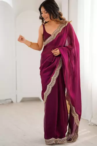 Wine tissue satin sequins saree with unstitched blouse piece.
