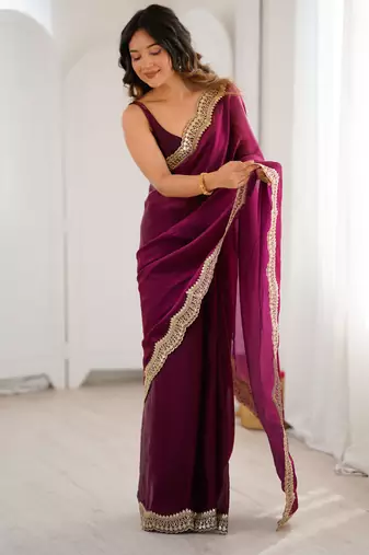 Wine tissue satin sequins saree with unstitched blouse piece.