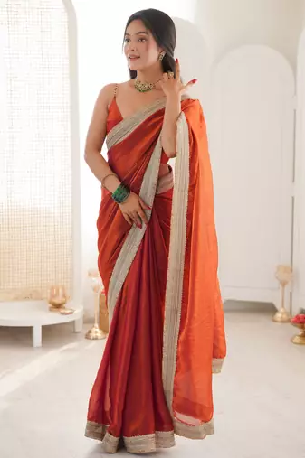 Oeange tissue satin solid saree with unstitched blouse piece.