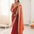 Oeange tissue satin solid saree with unstitched blouse piece.
