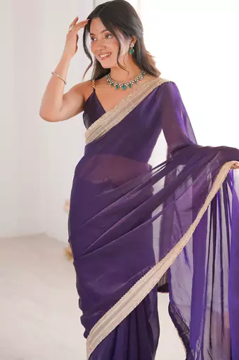Purple tissue satin solid saree with unstitched blouse piece.