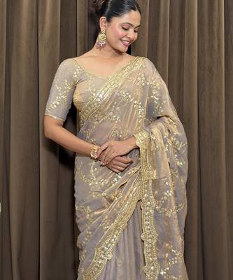 Beige tissue satin embroidered saree with unstitched blouse piece. 1