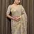 Beige tissue satin embroidered saree with unstitched blouse piece.