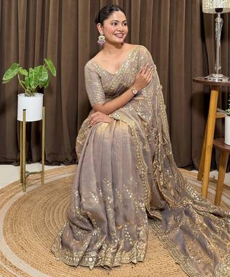 Beige tissue satin embroidered saree with unstitched blouse piece. 2