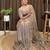 Beige tissue satin embroidered saree with unstitched blouse piece.