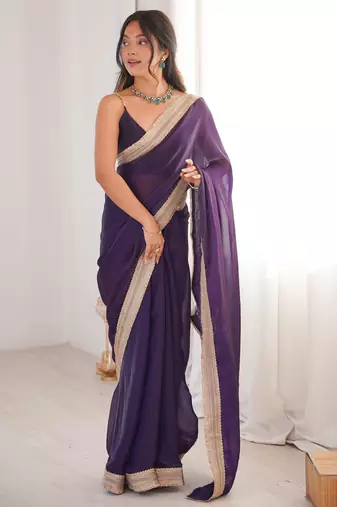 Purple tissue satin solid saree with unstitched blouse piece.