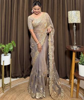 Beige tissue satin embroidered saree with unstitched blouse piece. 5