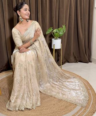 Cream tissue satin embroidered saree with unstitched blouse piece. 2