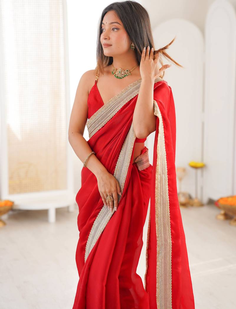 Red tissue satin solid saree with unstitched blouse piece.