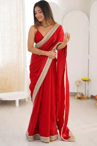 Red tissue satin solid saree with unstitched blouse piece.