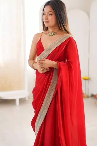 Red tissue satin solid saree with unstitched blouse piece.