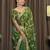 Green tissue satin embroidered saree with unstitched blouse piece.