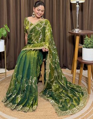 Green tissue satin embroidered saree with unstitched blouse piece. 2